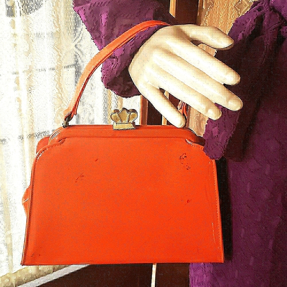 unknown Handbags - Elegant Orange Clutch with Gold Accents